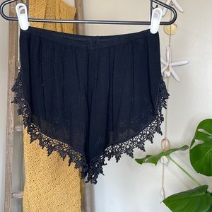 Beach shorts with crochet trim